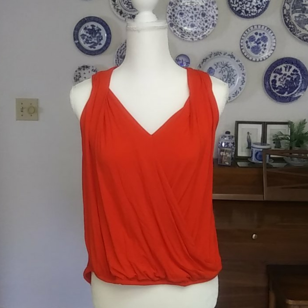 Red sleeveless top